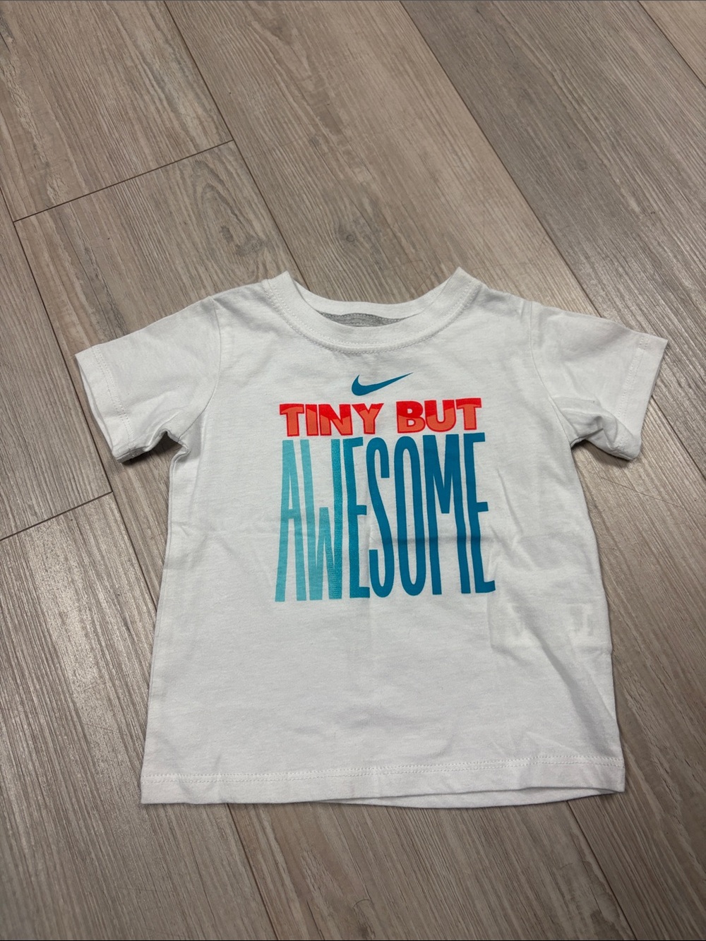 Nike White Tee with Red and Teal 'Tiny But Awesome' Graphic